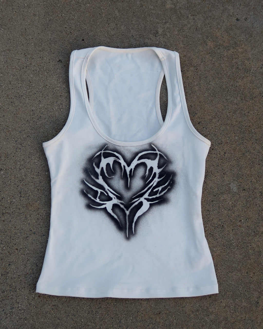 sc0rpia CYBER HEART TANK in white, front view, hand-airbrushed heart graphic in black 