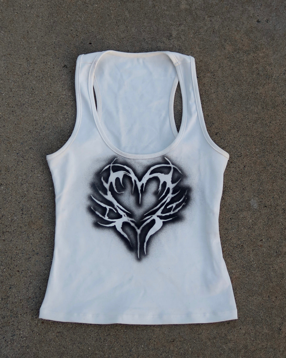 sc0rpia CYBER HEART TANK in white, front view, hand-airbrushed heart graphic in black 